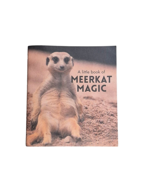 A copy of "A Little Book of Meerkat Magic" by Loren Boyd, featuring colorful illustrations of meerkats on the cover. nz