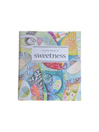 A Little Book of Sweetness by Loren Boyd, a small hardcover book with a colorful cover featuring playful illustrations. nz