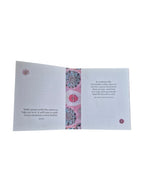 A hardcover copy of "A Little Book of Gratitude" by Loren Boyd, featuring a serene cover with soothing colors and floral accents. nz