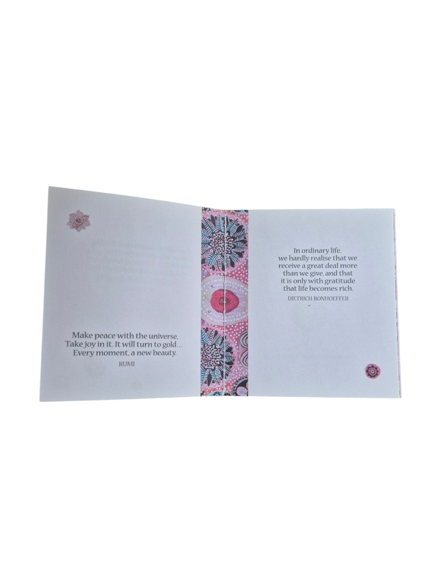 A hardcover copy of "A Little Book of Gratitude" by Loren Boyd, featuring a serene cover with soothing colors and floral accents. nz