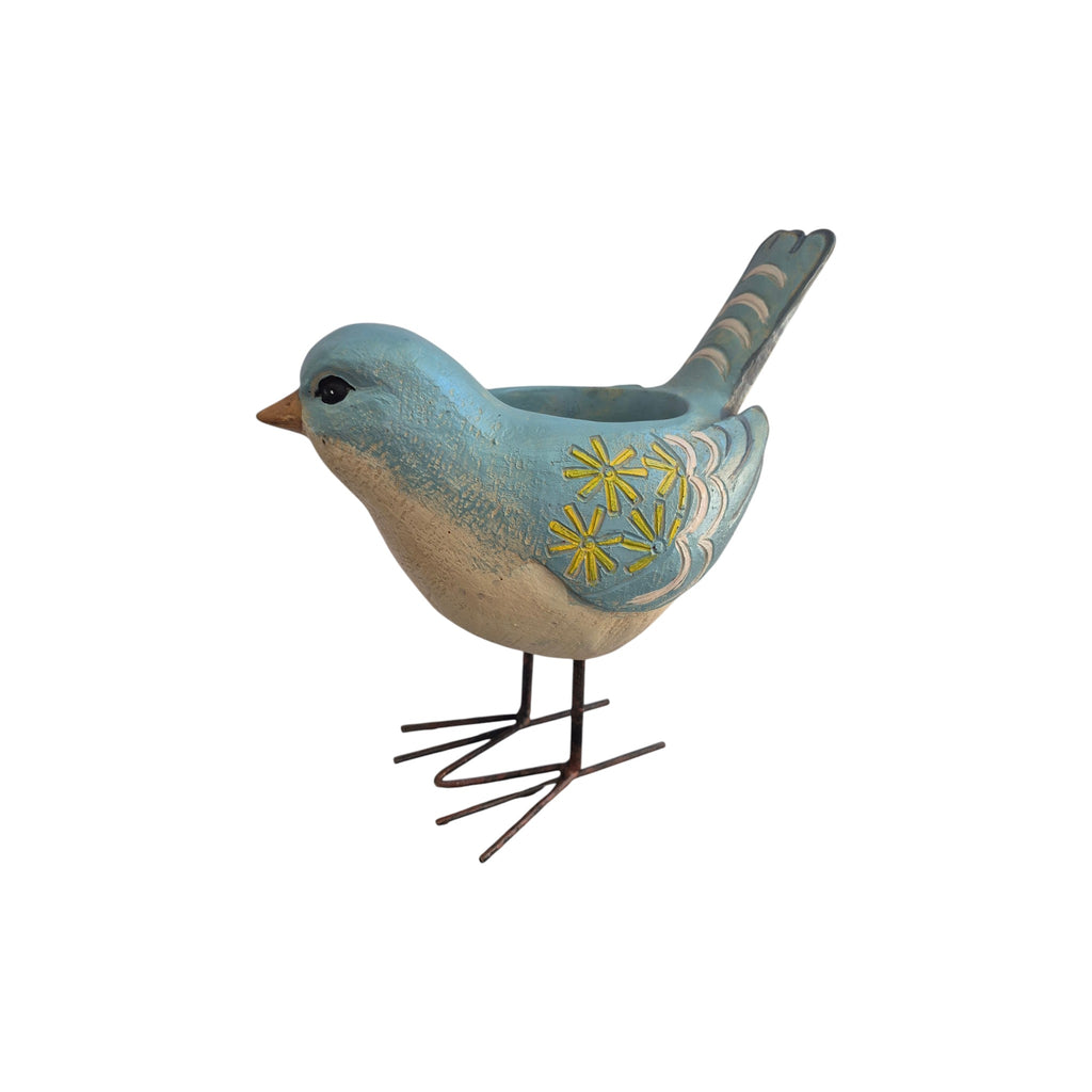 Blue bird-shaped planter with metal feet by Loren Boyd, featuring detailed bird design and sturdy metal stand for indoor or outdoor use. nz