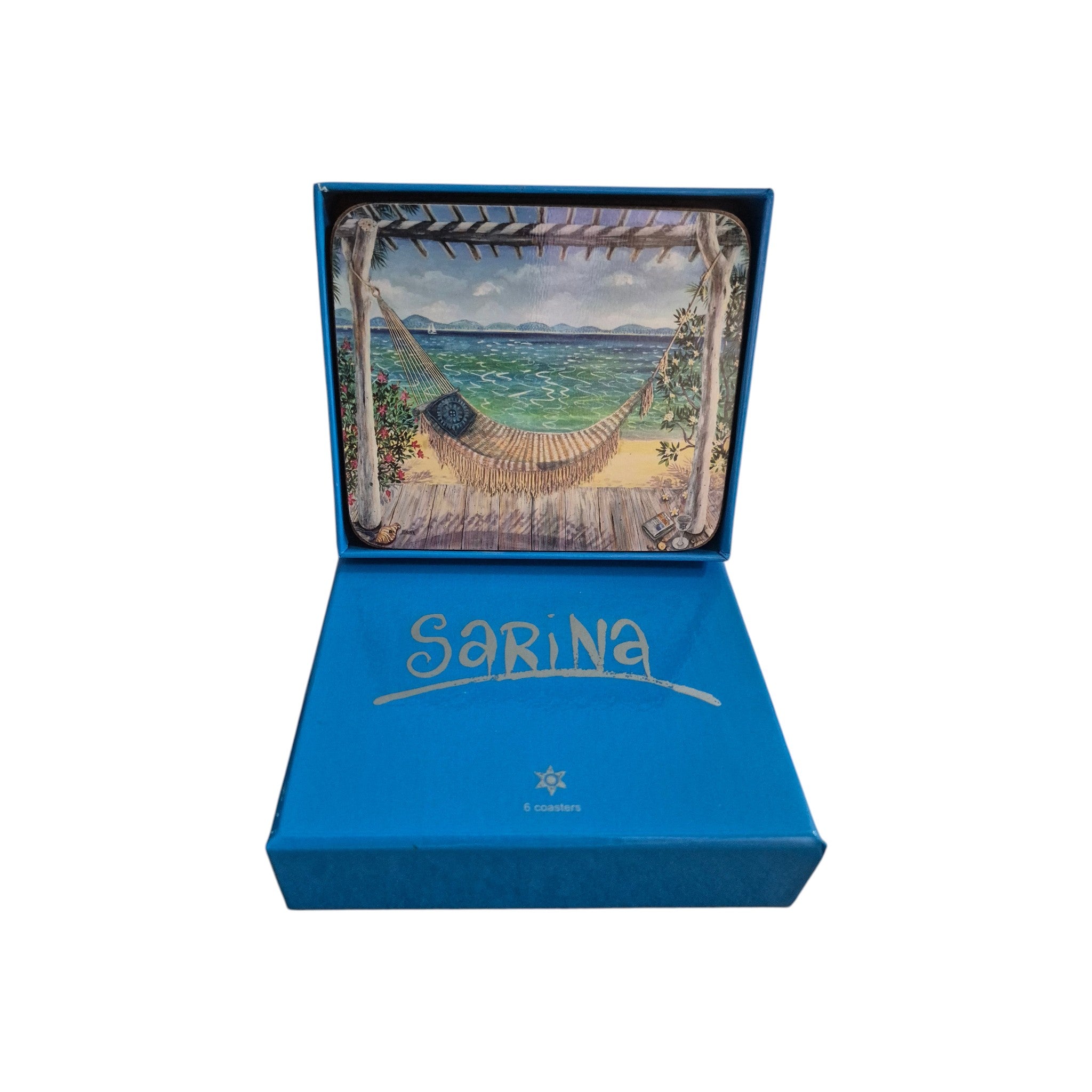 Six Loren Boyd Beach Balconies coasters with colorful seaside balcony designs on a wooden table. nz