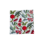 Set of four ceramic Pohutukawa coasters by Loren Boyd featuring vibrant floral designs for protecting surfaces. nz
