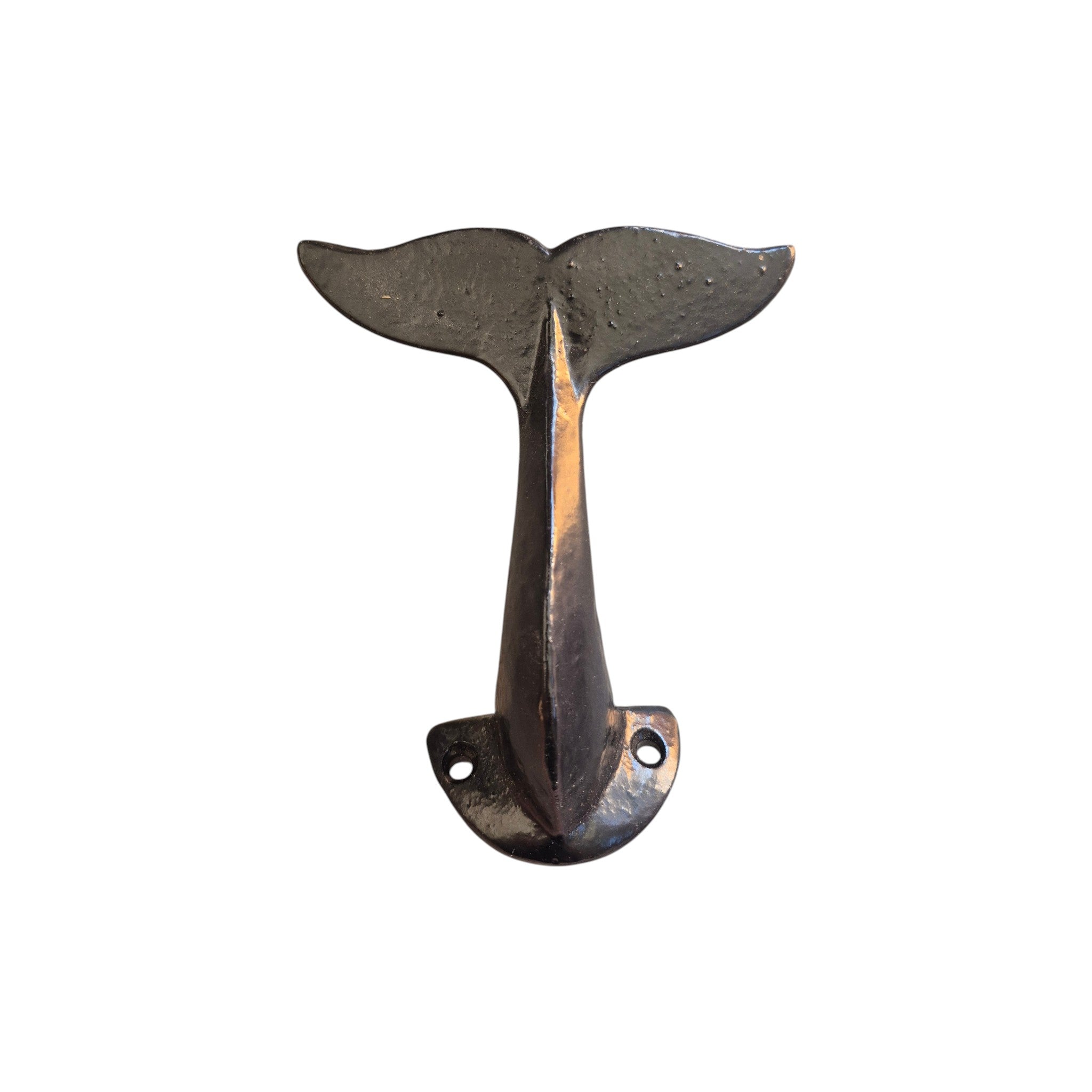 Black whale tail cast iron wall hook by Loren Boyd, featuring a detailed whale tail design for functional wall mounting decor. nz