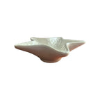 White ceramic starfish trinket dish, side view showing gently concave interior bowl and pearlescent glaze finish nz Loren Boyd