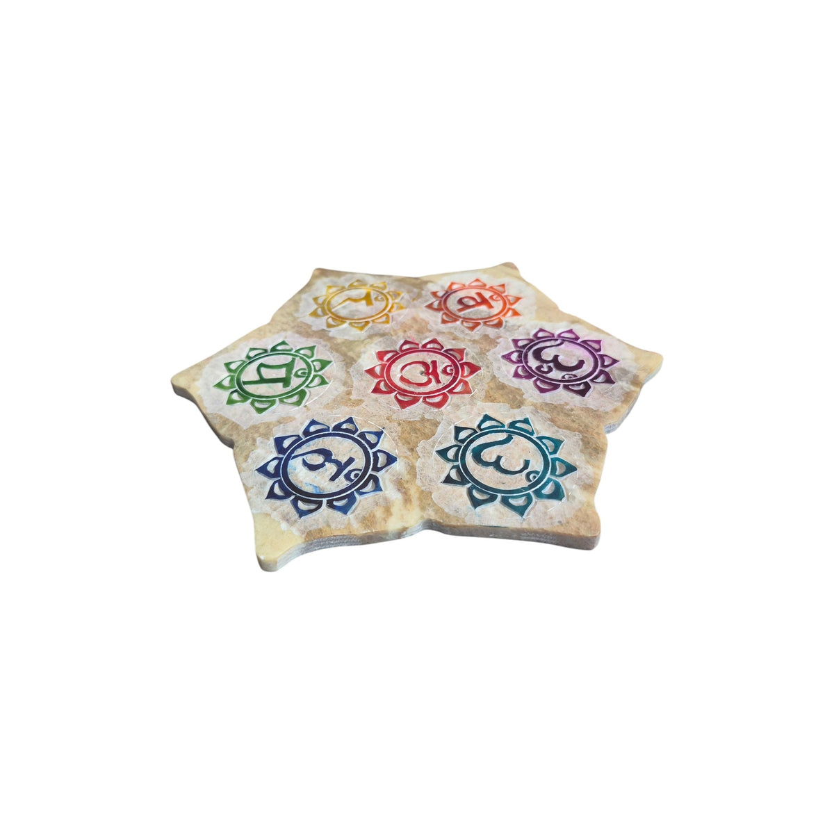 Soapstone lotus chakra incense holder at an angle showing seven colourful symbols