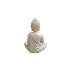Back view of seated white resin Buddha showing textured hair and draped robe