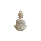 Back view of white resin meditation Buddha showing draped robe and textured hair