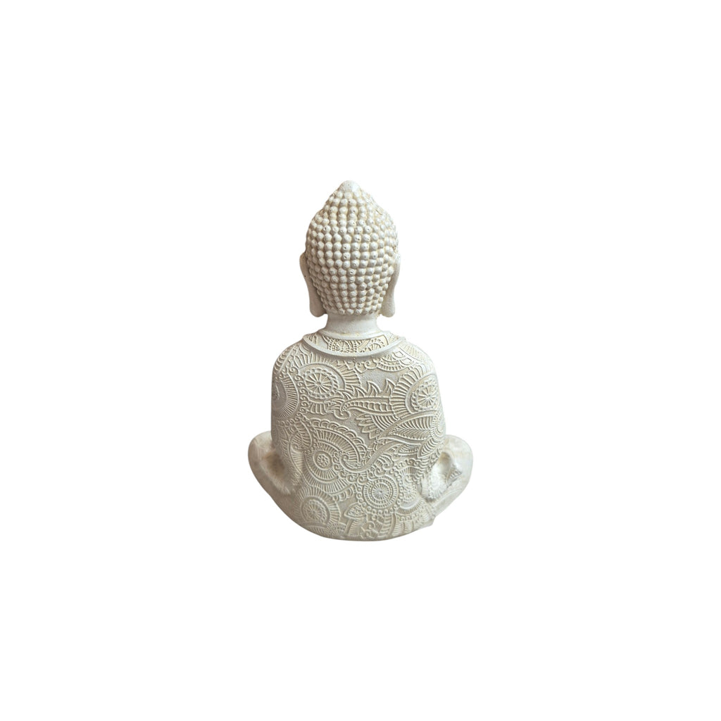 Back view of white resin seated Buddha showing ornate robe pattern and textured hair