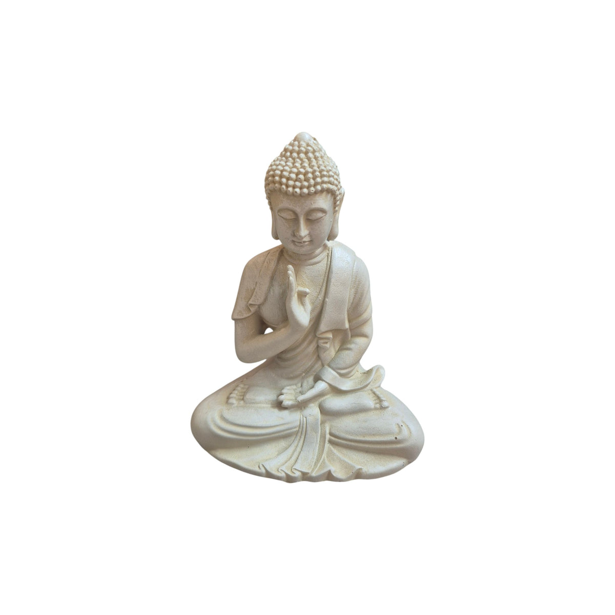 Front view of seated white resin Buddha with one hand raised in a protective gesture
