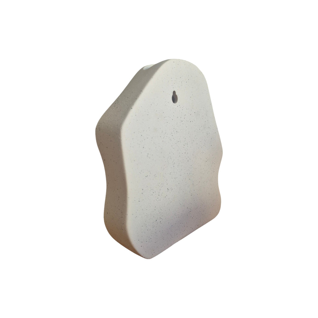 White Face Sandstone Vase back view showing smooth white sandstone texture and wall-hanging hole
