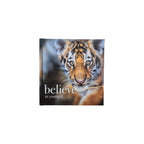 Believe in Yourself hardback book — cover featuring close-up full-bleed photograph of a tiger cub with white script believe in yourself lettering at bottom