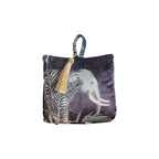Jungle Velvet Doorstop Black by LeForge — front view showing majestic elephant emerging through tropical ferns on deep charcoal midnight velvet with gold tassel