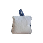 You Me and the Sea Doorstop by LaVida — back view showing plain natural cream woven fabric reverse with navy side panels and loop handle