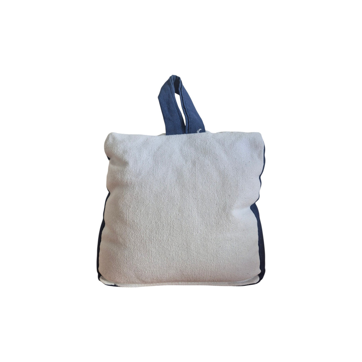 You Me and the Sea Doorstop by LaVida — back view showing plain natural cream woven fabric reverse with navy side panels and loop handle