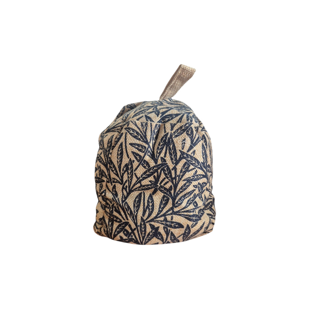 William Morris Tapestry Style Doorstop by LaVida — front view showing woven navy willow branch and leaf botanical print on natural linen ground with linen loop handle