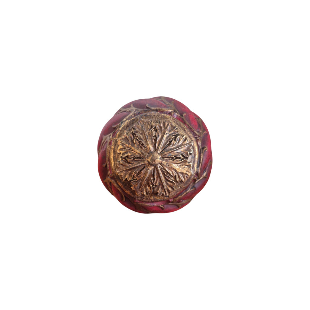 Red Gold Vine Decorative Ball top view showing raised antique gold botanical medallion centrepiece