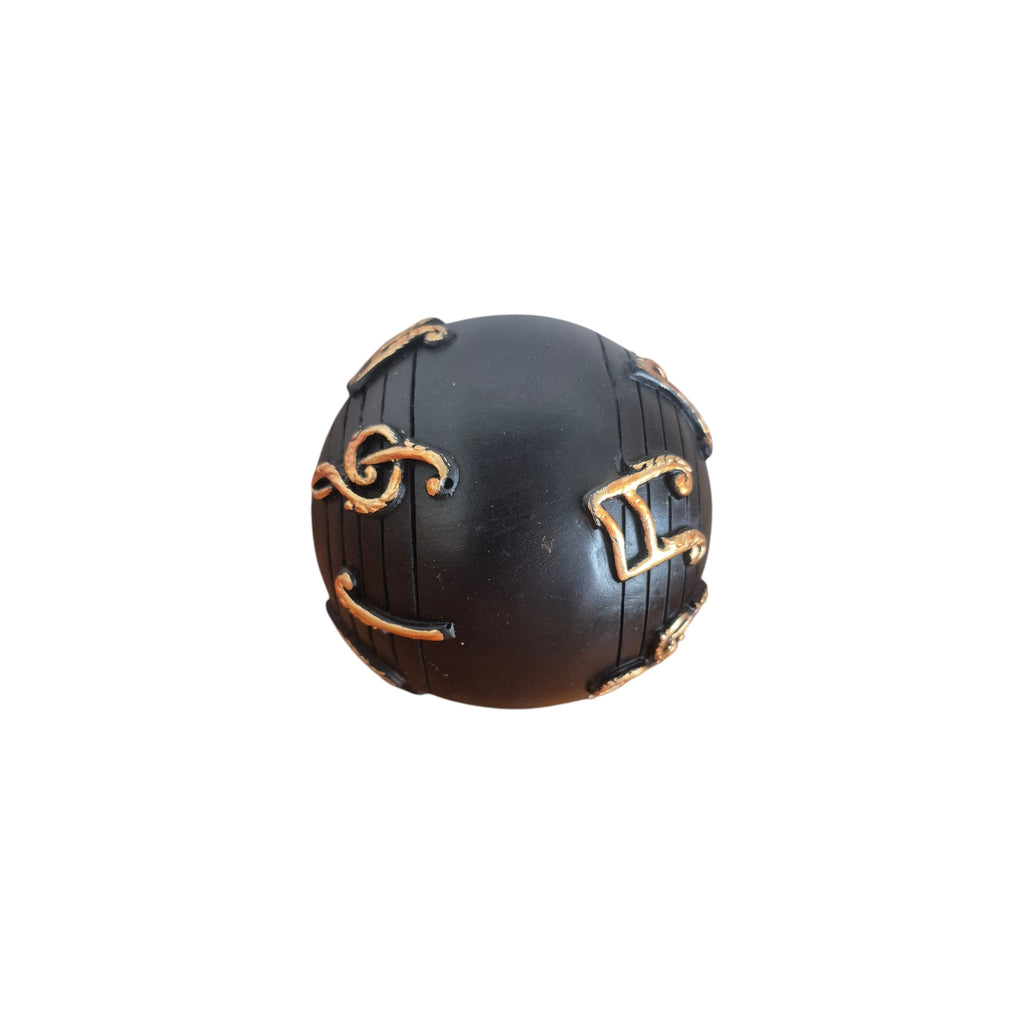 Musical Notes Decorative Ball side view showing additional gold musical note and treble clef detail against matte black finish