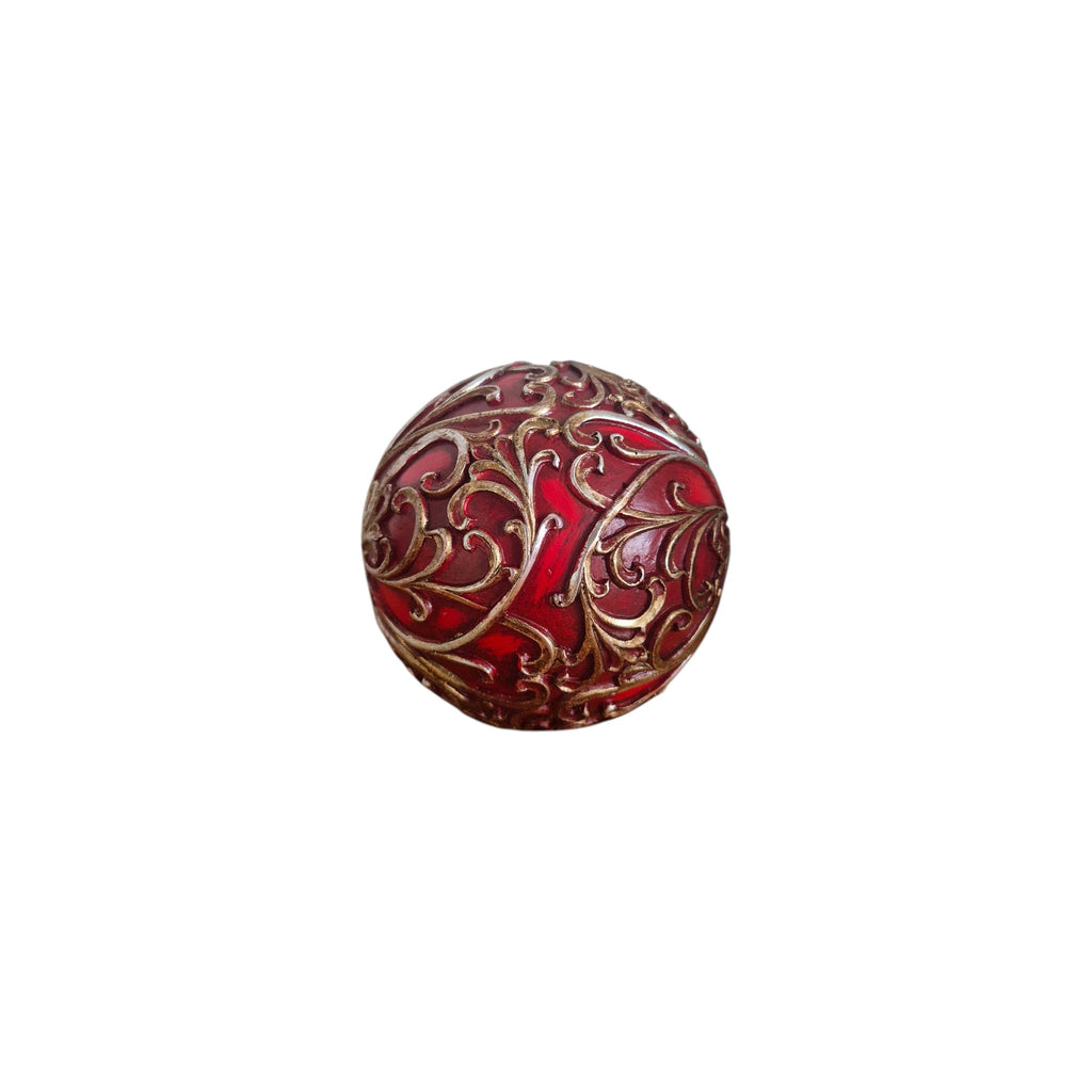 Red and Gold Filigree Decorative Ball front view showing deep crimson lacquer base with intricate antique gold scrolling vine and leaf filigree lattice