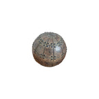 Nordic Rivet Decorative Ball Copper — front view showing warm copper-bronze resin sphere with raised rivet studs and radiating panel seams across sandy textured surface, 11cm diameter