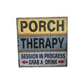 Porch Therapy wooden sign — distressed yellow, blue, and white multi-panel timber board reading 'Porch Therapy, Session in Progress, Grab a Drink' with red directional arrows, 40cm x 40cm