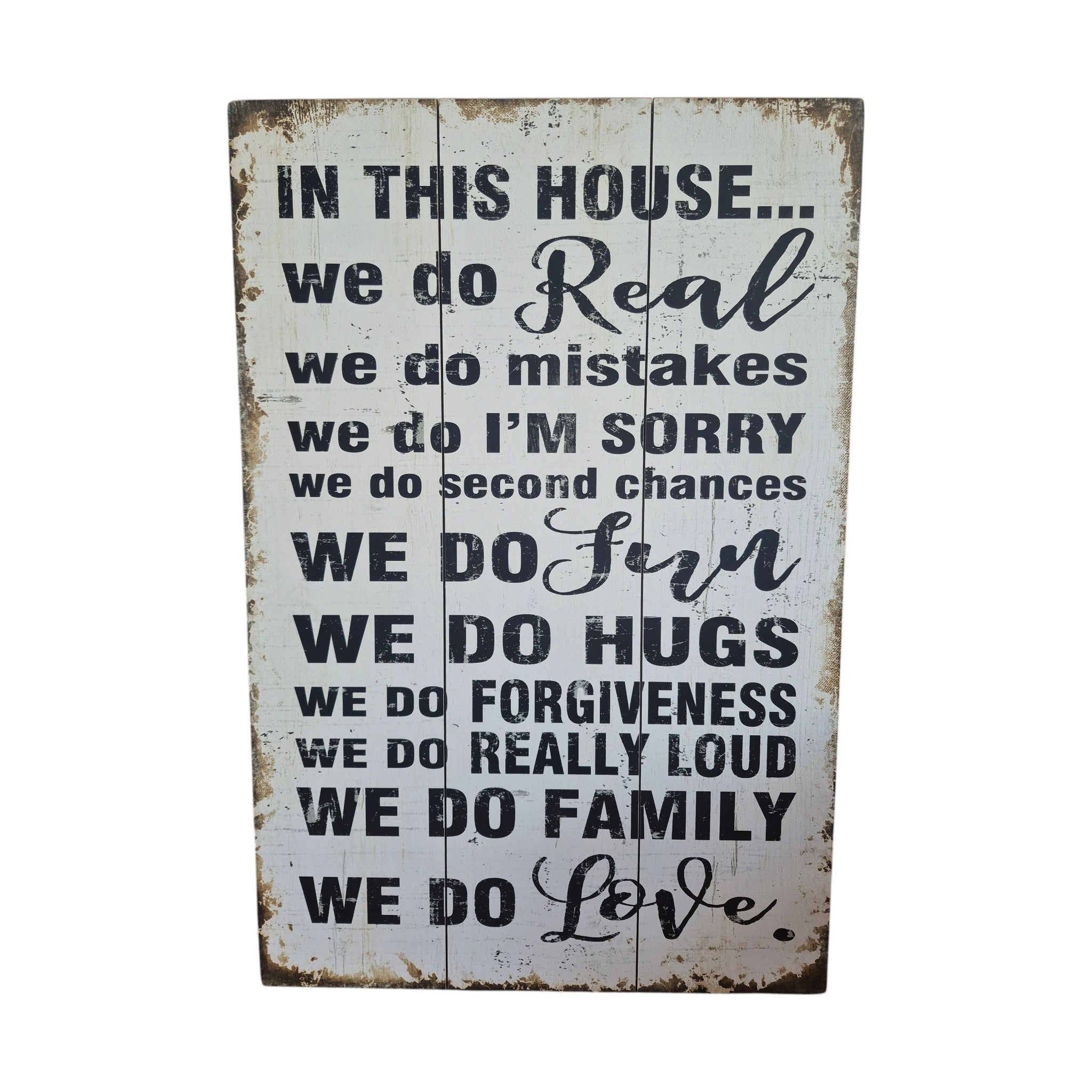 In This House wooden sign — distressed antique white multi-panel timber board with charcoal block and script lettering listing family values including Real, Hugs, Forgiveness, Family and Love, 60cm x 40cm. nz