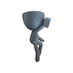 Black wall-mounted Egghead Planter, side view