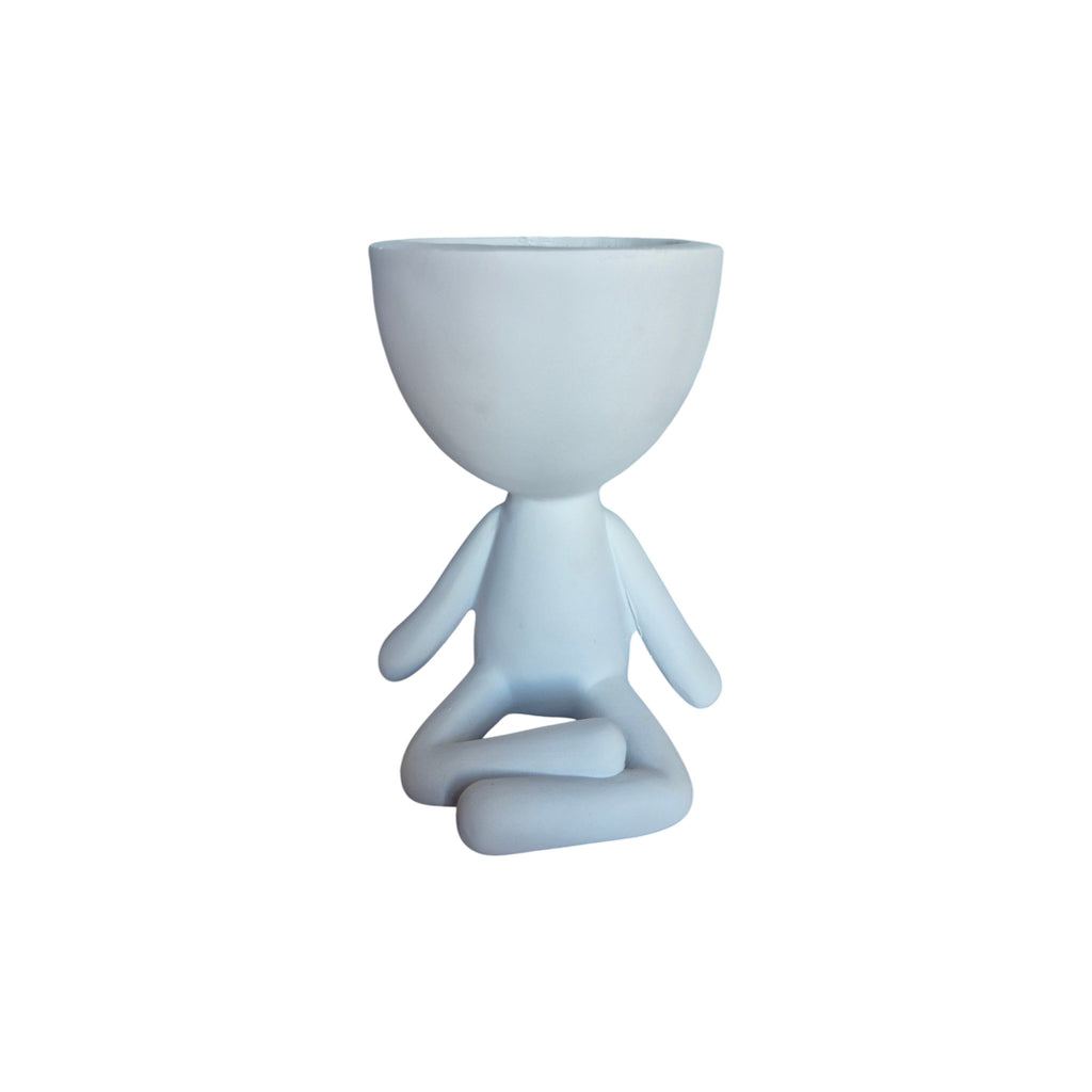 White yoga-sitting Egghead Planter, top view