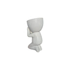 White Faithful Egghead Planter, kneeling view