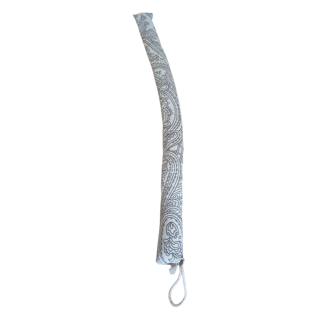 Beige patterned draught stopper 82cm curved to show its decorative print and hanging loop