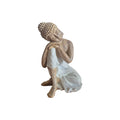 Back view of wood-look resin Buddha showing pale robe and textured hair