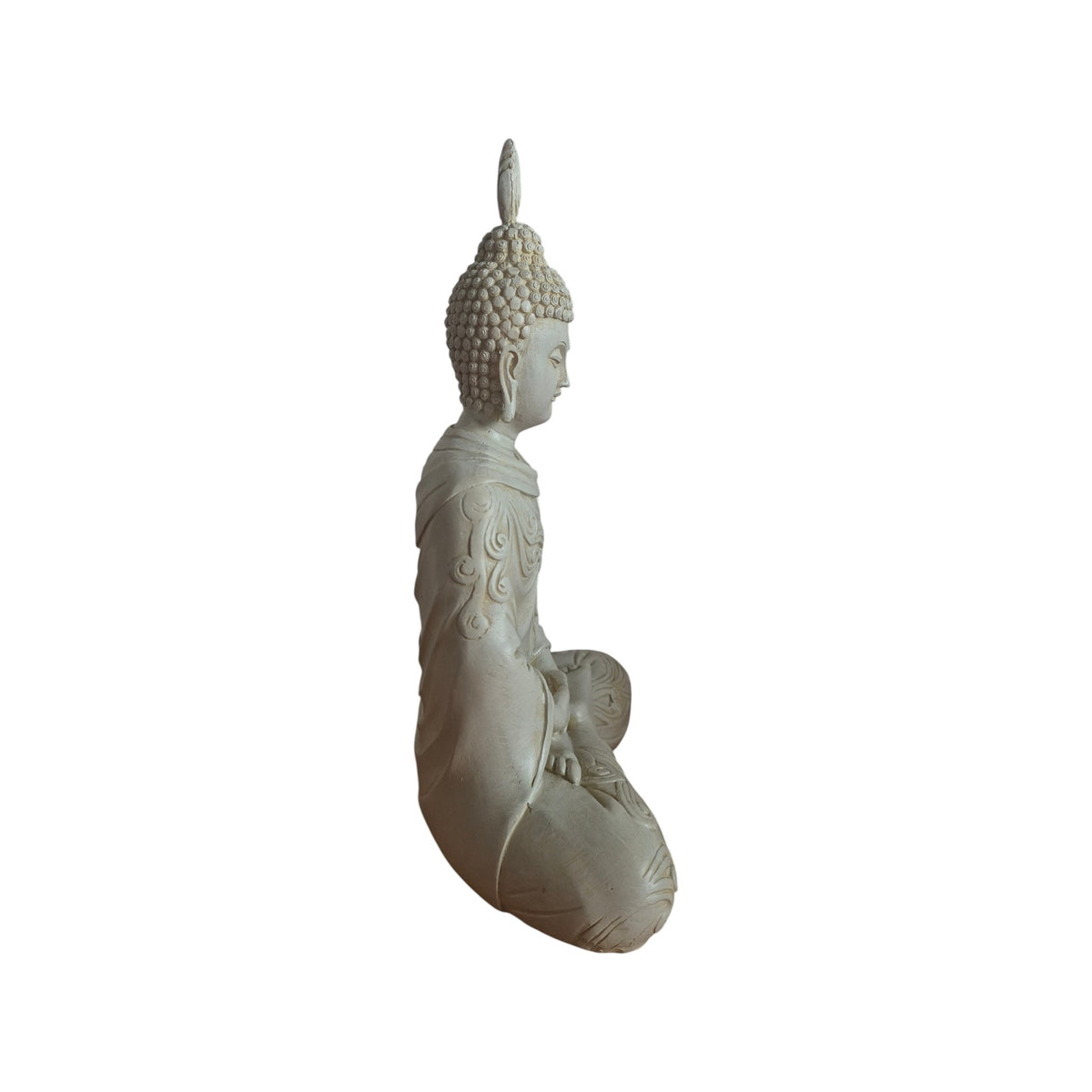 Back view of cream meditating Buddha showing draped robe and textured hair