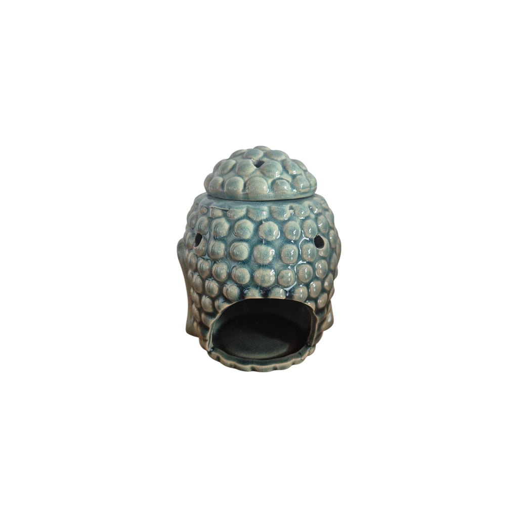 Front view of crackle-glaze Buddha head oil burner with blue-grey finish