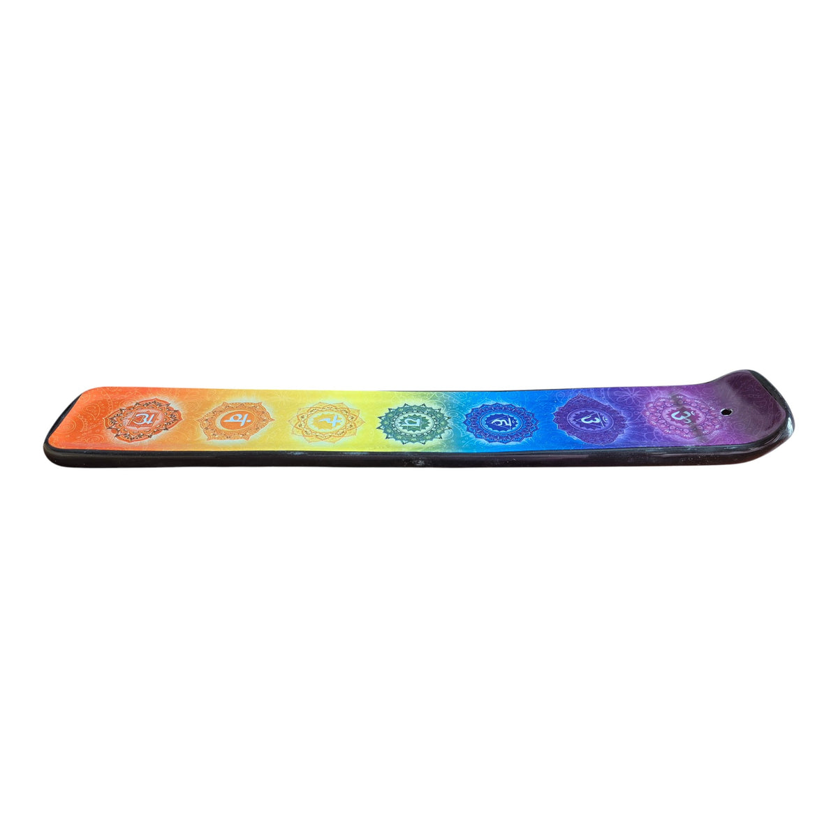 Chakra ceramic incense holder shown from underneath with pale blue base