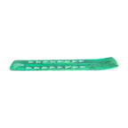 Green wooden incense holder with white motifs, top view