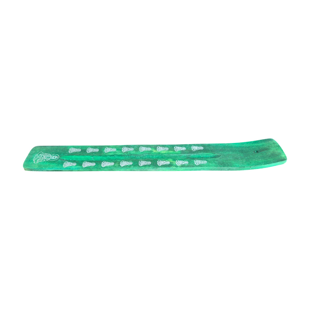Green wooden incense holder with white motifs, top view