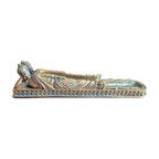 Top view of reclining Buddha incense holder with long central ash-catching tray
