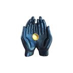 Dark open hands cone incense holder with gold-toned cup in the palms, side view