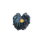 Front view of dark cupped open hands incense holder with small gold-toned cup