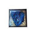Example purple iridescent aura quartz geode in a presentation box