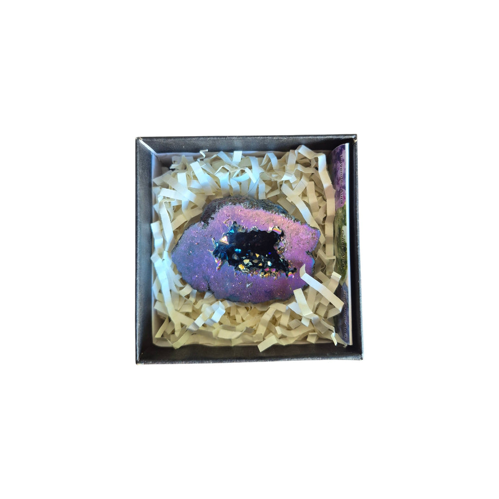 Example vivid blue aura quartz geode in a presentation box
