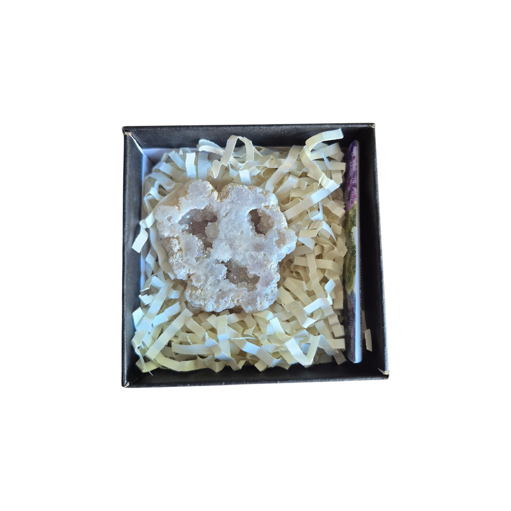 Example purple and dark iridescent aura quartz geode in a presentation box