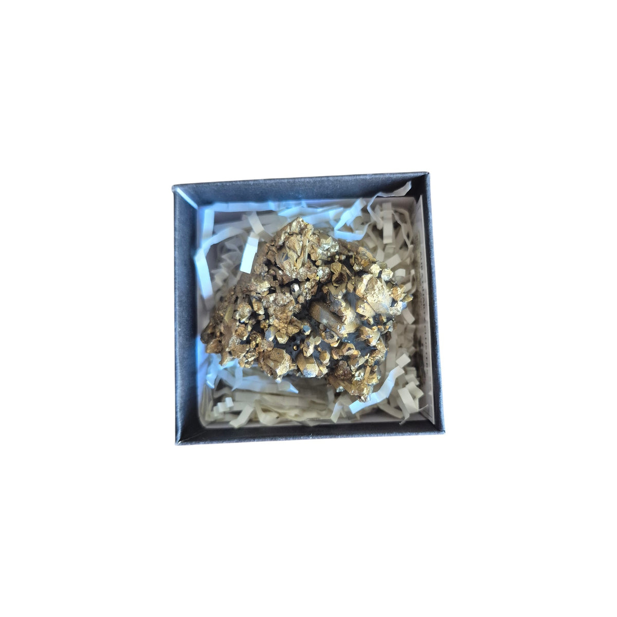 Example dark purple iridescent geode in a presentation box