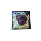 Example gold-toned crystal geode in a presentation box