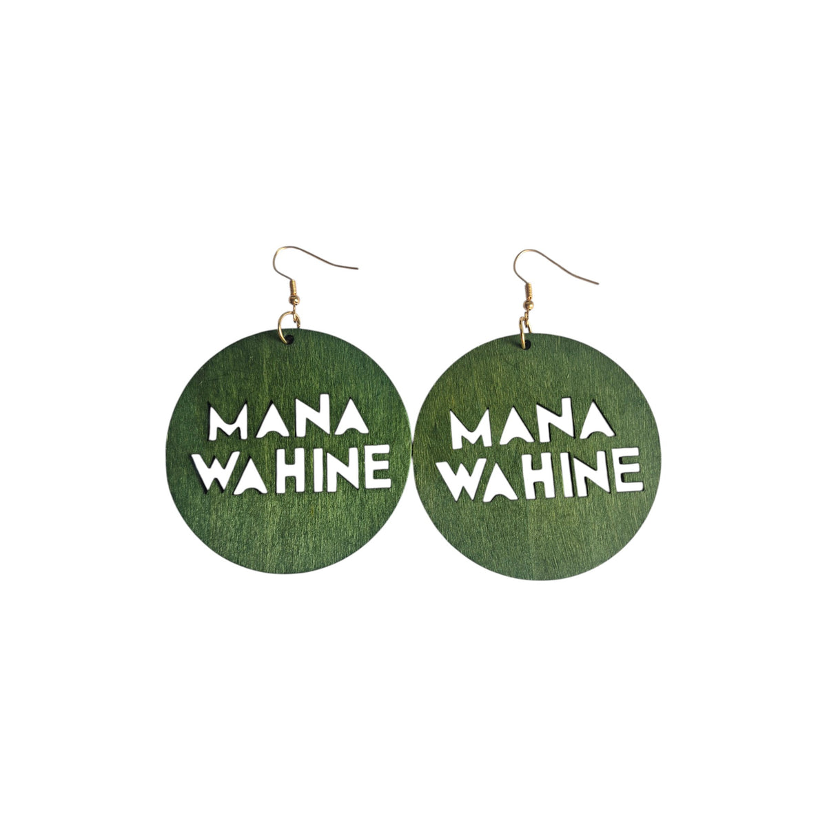 Pair of green round wooden drop earrings with cut-out MANA WAHINE lettering and gold-tone hook ear wires on a white background