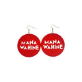 Pair of red round wooden drop earrings with cut-out MANA WAHINE lettering and gold-tone hook ear wires on a white background