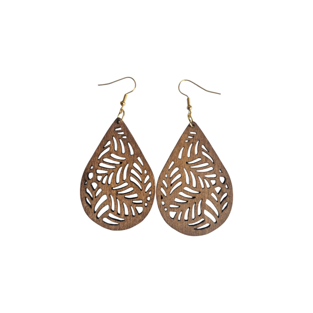 Pair of brown wooden teardrop earrings with leafy botanical cut-outs and gold-tone hook ear wires on a white background