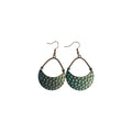 Pair of bronze-tone metal drop earrings with open teardrop frames and green circular detailing on curved lower panels
