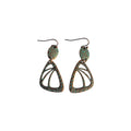 Pair of bronze-tone metal earrings with rounded triangular openwork drops, green dotted accents, oval connectors and hook ear wires on white