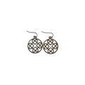 Pair of bronze-tone round metal drop earrings with four openwork Celtic heart knot motifs, subtle green accents and hook ear wires on white